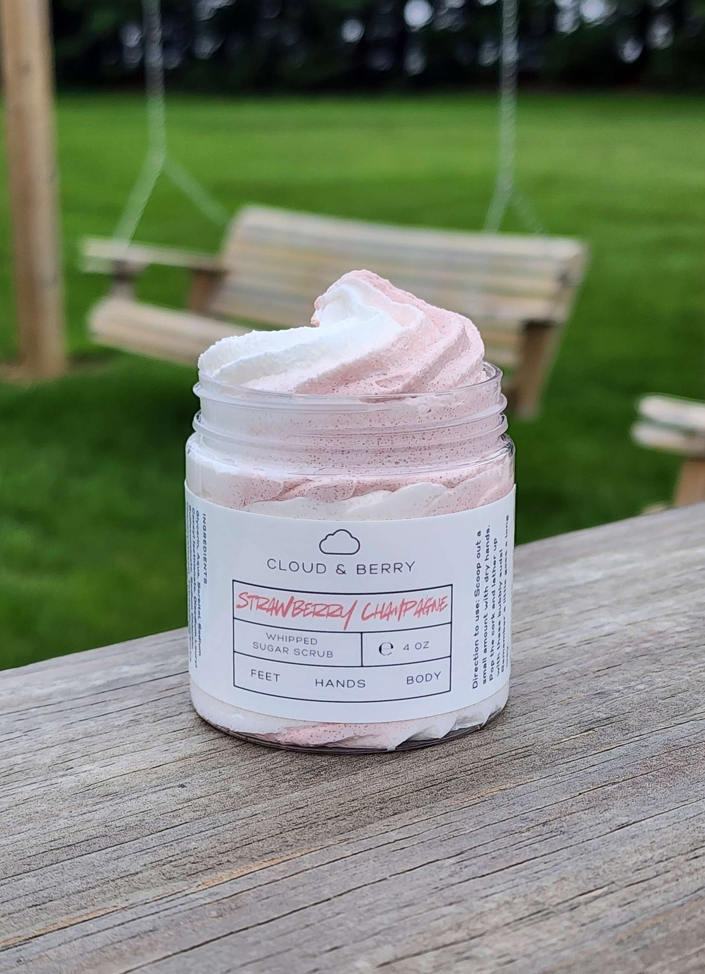 whipped sugar scrub with white and pinkish/red swirls