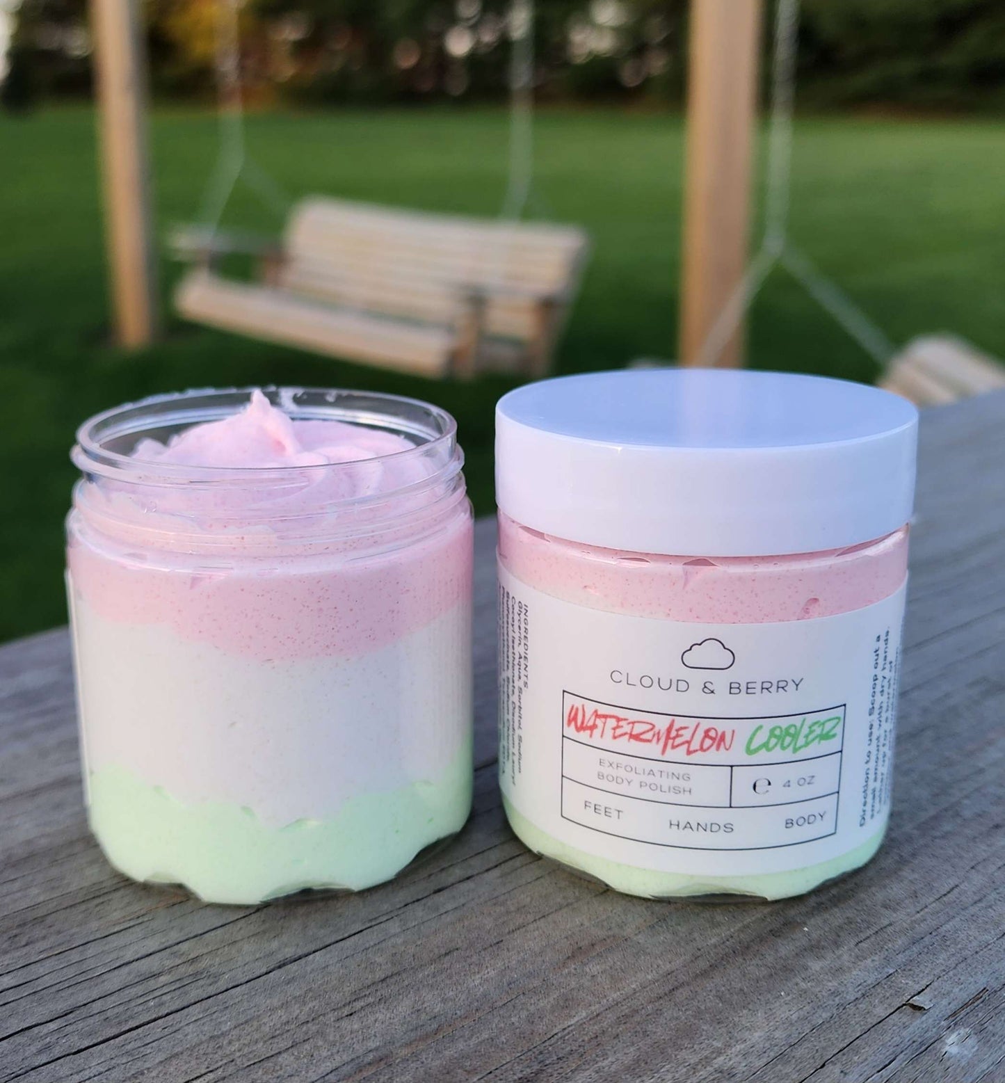2 jars of watermelon cooler exfoliating body polish soap. colors are green bottom, white middle and pink top.